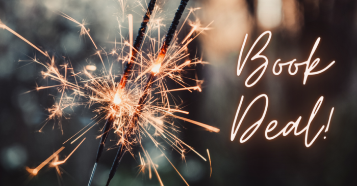 sparkler next to text that reads book deal